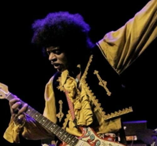 Hendrix playing his guitar